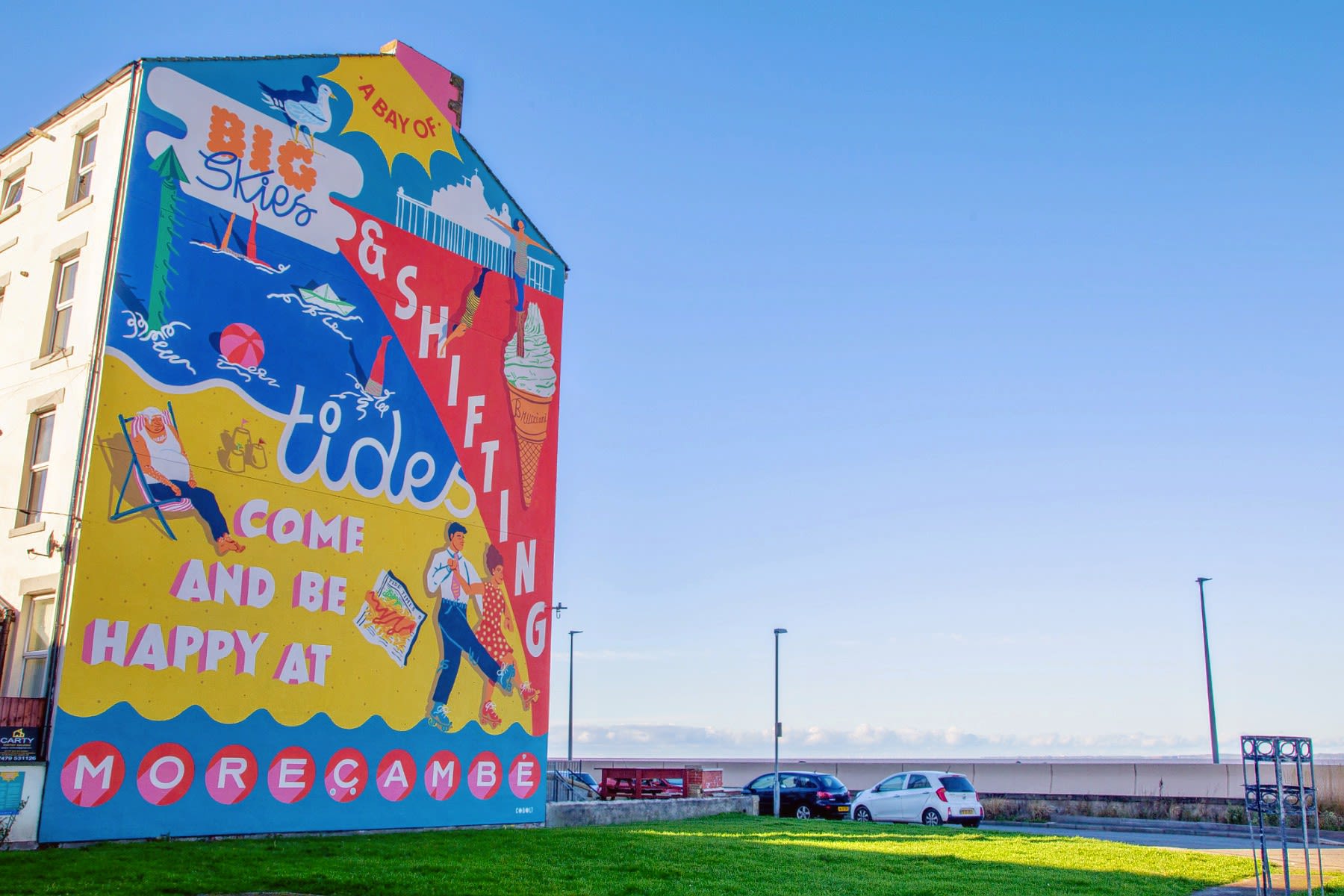 A colourful mural on the end of a house in Morecambe.